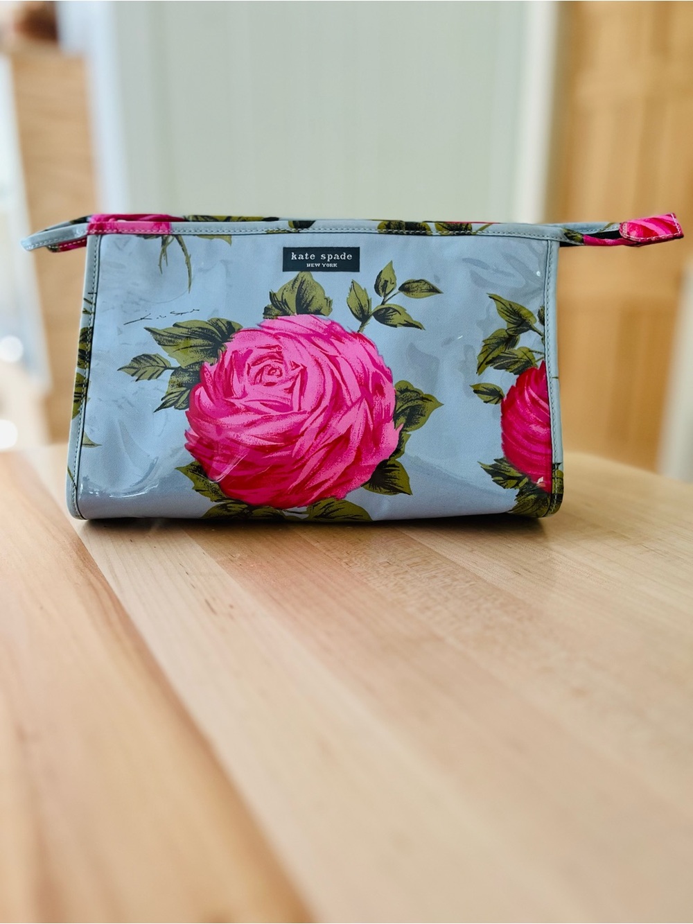 Kate Spade New York cosmetic pouch featuring the iconic "Cabbage Rose"